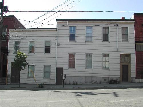 This photograph shows the contextual view of the building, 2004; City of Saint John