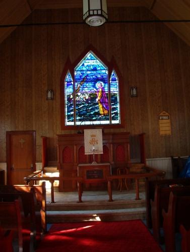 Interior view of the church showing the stained glass window at the altar.  Photo taken October 17, 2006.; HFNL/ Deborah O'Rielly 2006