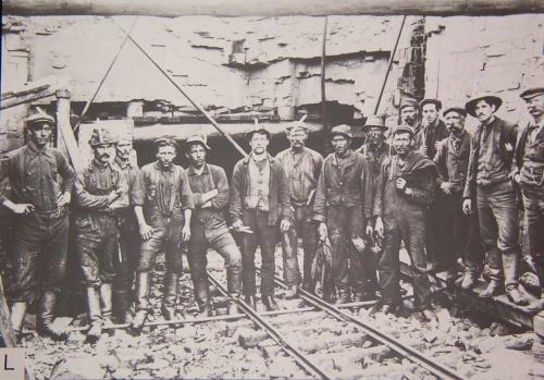 Dominion Company miners at the collar of the No. 2 Mine (above ground opening to the mine).  Date unknown, possibly 1920s.; No. 2 Mine and Museum, 2006