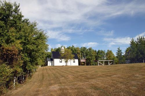 Contextual view, from the southwest, of Sts. Peter and Paul Ukrainian Catholic Church, Rossburn area, 2006; Historic Resources Branch, Manitoba Culture, Heritage and Tourism, 2006