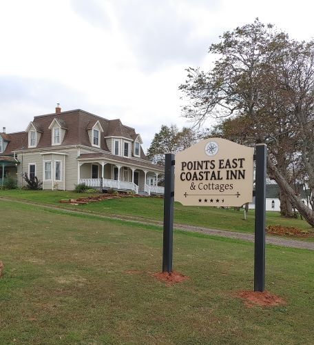 Front and side elevations; Points East Coast Inn, 2022