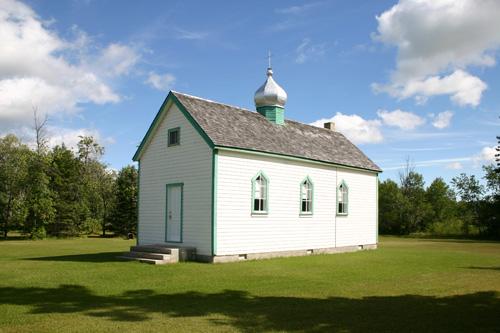 Primary elevations, from the southwest, of St. Mary's Ukrainian Catholic Church, Dnister, 2006; Historic Resources Branch, Manitoba Culture, Heritage, Tourism and Sport, 2006