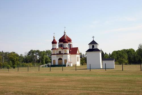 Contextual view, from the west, of the Ukrainian Catholic Church of the Immaculate Conception, Winnipegosis, 2006; Historic Resources Branch, Manitoba Culture, Heritage and Tourism, 2006