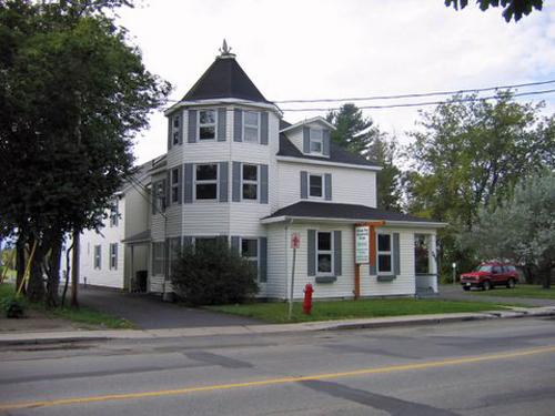 A front view of J. Flavien Doucet's home which has remained mostly untouched. ; City of Bathurst