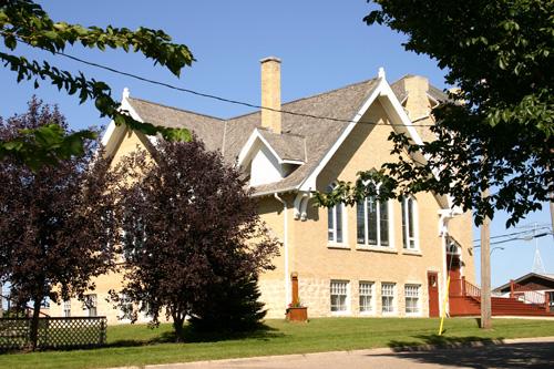 Secondary elevations, from the southeast, of Treherne United Church, Treherne, 2006; Historic Resources Branch, Manitoba Culture, Heritage, Tourism and Sport, 2006