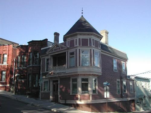 This photograph shows the contextual view of the building, 2005; City of Saint John