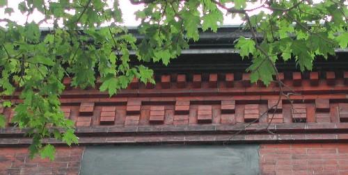Edwin Peters Residence - This image provides a view of the cornice ornamented with brick dentils, 2005.; City of Saint John