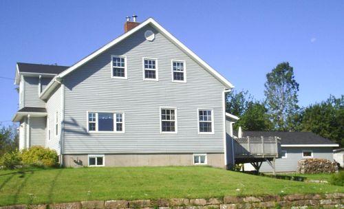 Morice House - Side view - House borders on Morice Pond; Town of Sackville