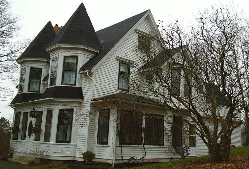John Johnson House - Side View - Sun porch added for family ; Town of Sackville