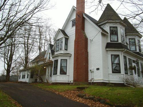 John Johnson House - Driveway view of the house - decorative bay windows ; Town of Sackville