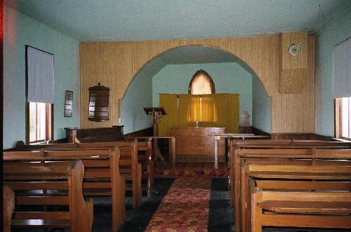 View from the nave looking towards the sanctuary of the Marieton Church and Cemetery, 2006.; Ross Herrington, 2006.