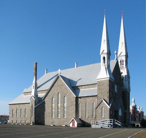 West side of Saint-Jean-Baptiste Church showing Gothic Revival features.; Restigouche Regional Museum, Dalhousie