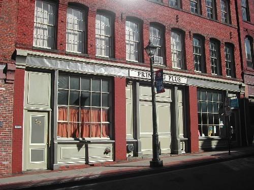 This photograph shows the storefront and its oversized multi-paned windows, 2004; City of Saint John