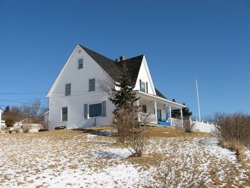 Dorey House, front and west side view from highway,2007; HRM Heritage Property Program, 2007.