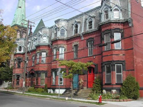 This photograph shows the contextual view of the complex. The T. William Bell Residence is the second building in the picture, 2004; City of Saint John