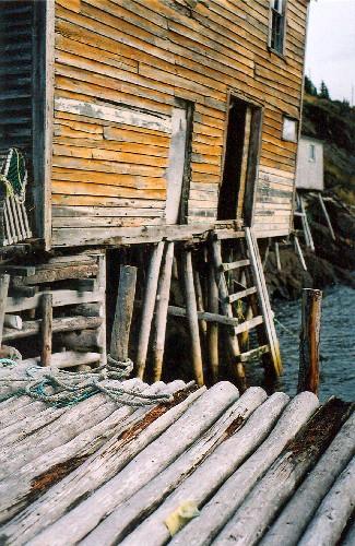 Photo view of the water side of Noah Chippett Stage/Twine Loft and adjoining wharf, Leading Tickles, 2005.; HFNL 2007