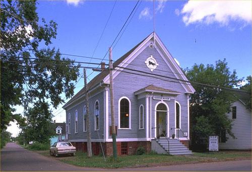 Corner view of the Alberton Court House, 1987.; Parks Canada Agency/Agence Parcs Canada, 1987.