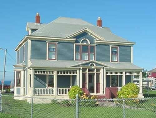 View of left and front facades of J. B. Foote House, Grand Bank, NL.; HFNL 2005