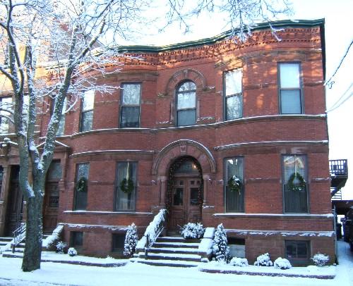 This photograph shows the contextual view of the building on Germain Street, 2006.; City of Saint John