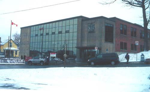 Corner view of the Government of Canada Building.; Public Works and Government Services Canada / Travaux publics et Services gouvernementaux Canada.
