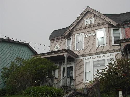 This photograph shows the front facade of the William Hawker unit, 2005; City of Saint John