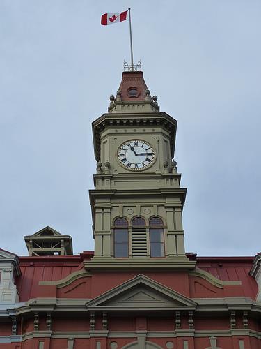 Detail view of Victoria City Hall, showing the central clock tower, 2011.; Parks Canada Agency / Agence Parcs Canada, Andrew Waldron, 2011.