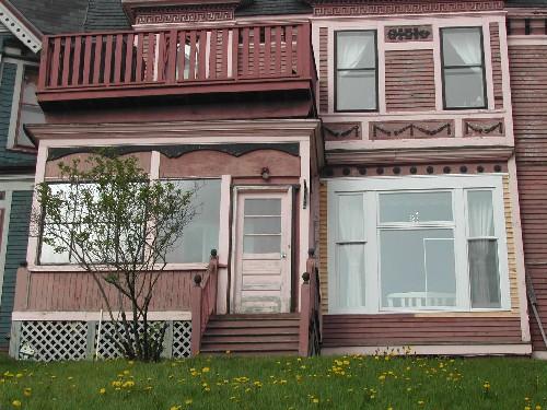 This photograph shows the lower section of the bay window and the porch, 2005 ; City of Saint John