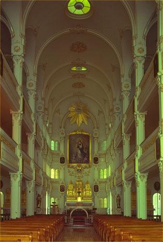 Central view of the interior of the Bon-Pasteur Chapel, 1980.; Parks Canada Agency/ Agence Parcs Canada, 1980.