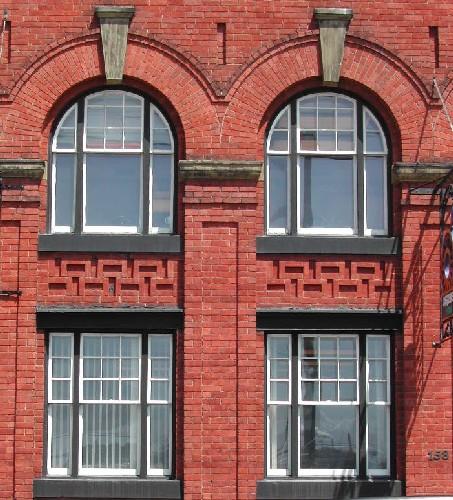 This photograph shows the lower windows, 2005; City of Saint John