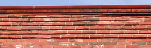 This image provides a view of the brick corbel band pattern below the cornice, 2005. ; City of Saint John