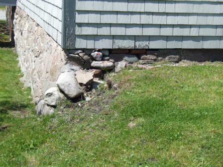 Stone rubble foundation, Coyle House, Shelburne, Nova Scotia, 2007.
; Heritage Division, NS Dept. of Tourism, Culture and Heritage, 2007.