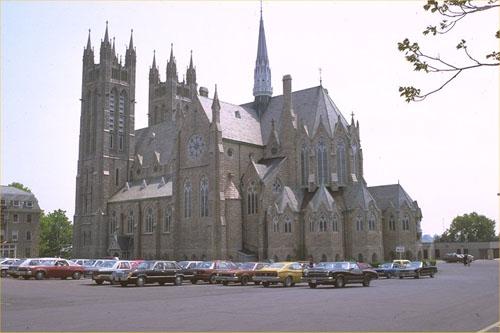 Corner view of Our Lady of the Immaculate Conception National Historic Site of Canada, showing both side and rear elevations, 1991.; Parks Canada Agency / Agence Parcs Canada, 1991.