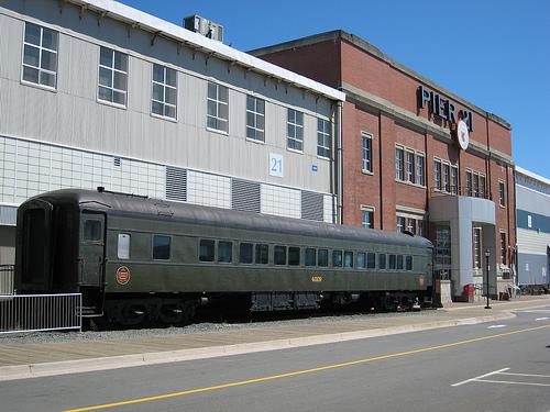 Side view of Pier 21, showing its site on a pier in Halifax Harbour behind the railway station, 2009.; Pier 21, Michael Sprague, 2009.