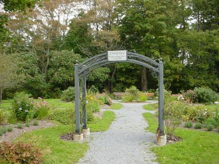 Garden view showing the wrought iron arch; Town of St. Stephen