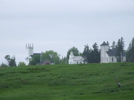 St. Denis, Minudie School Museum, King Seaman Church (l-r) Minudie, Nova Scotia, 2007.
; Heritage Division, NS Dept. of Tourism, Culture and Heritage, 2007.