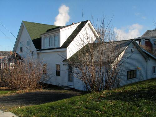 View of south and west sides of the MacLean Residence showing attached buildings.; Restigouche Regional Museum, Dalhousie