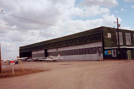 General view of BCATP Hangar No 1, showing north elevation, 1999.; Stephen Hayter, Commonwealth Air Training Plan Museum, Inc., 1999.
