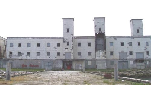 View of the seaward facing side of Salt Fish Plant, Port Union, NL, June 2006.; HFNL/Deborah O'Rielly 2006
