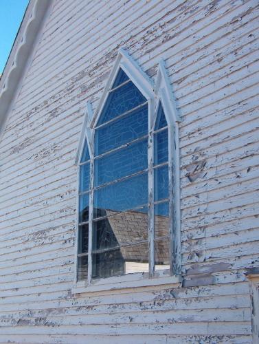 View of stained glass window found at the rear of the church - located in the altar inside.  The window was donated by prominent community members.  Photo taken October 17, 2006; HFNL/ Deborah O'Rielly 2007
