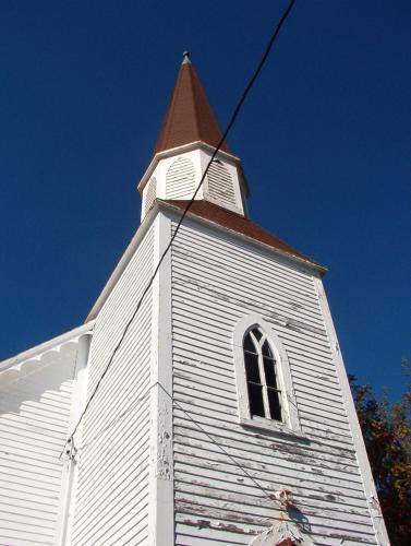 View of the square tower with its steeply-pitched spire, Spaniard's Bay, NL. Photo taken October 17, 2007; HFNL / Deborah O'Rielly 2007.