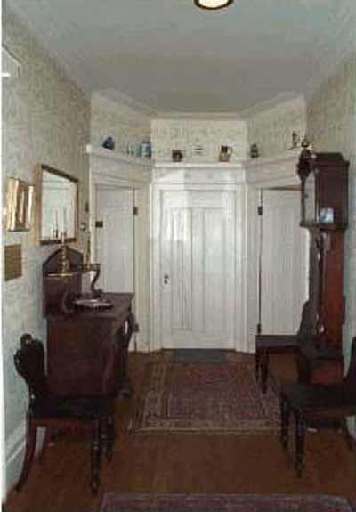 General view of the main entrance hall, inside the Henry-Stuart House.; Parks Canada Agency/Agence Parcs Canada, C. Desmeules.