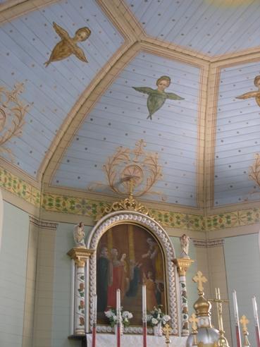 View of the interior of the Presentation of the Blessed Virgin Mary Ukrainian Catholic Church (Delph), Lamont County, showing part of the walls and sanctuary (November 2005); Lamont County, 2005