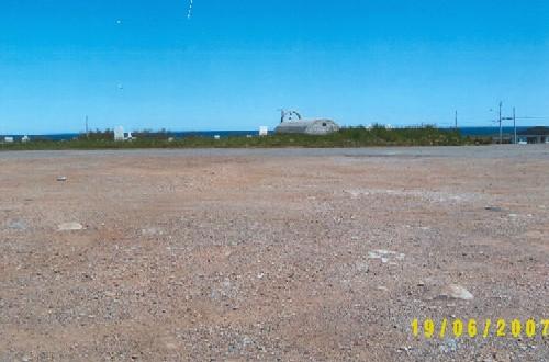 Photo view from the Lourdes Land Settlement Site area towards Roman Catholic parish cemetery, Lourdes, NL, 2007; Bill O'Gorman, 2007