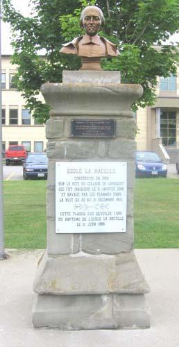 Bust of St. John Eudes on a stone pedestal. This dressed-stone pedestal is one of the rare artefacts from the Collège de Caraquet.; Fidèle Thériault
