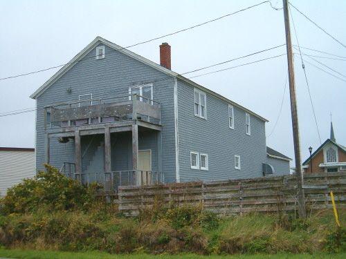 Rear and east elevation, Navy League Building, Louisbourg, Nova Scotia, 2004.
; Heritage Division, NS Dept. of Tourism, Culture and Heritage, 2004.