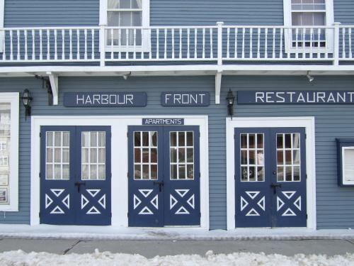 This photograph shows the three entrances to the building and illustrates the false balcony, 2007; Town of St. Andrews