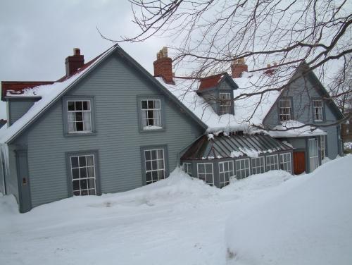 View of main facade showing one of two glass-roofed bay windows.  Photo taken February 2007.; HFNL 2007