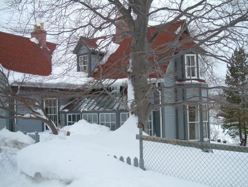 View of eastern wing of the house, showing the two-storey bay overlooking the largest portion of the property.  Photo taken Februrary 2007.; HFNL 2007
