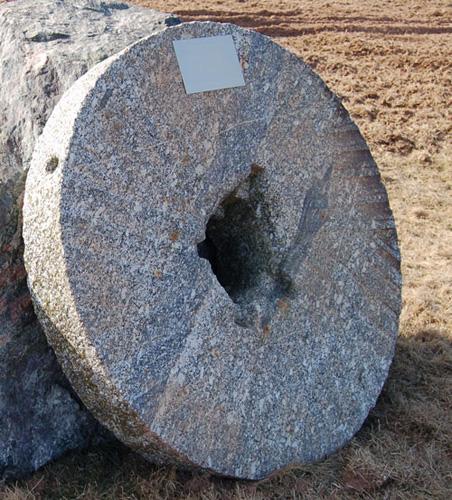 Ben Harshman House - A millstone from the Harshman mill is located on the Ben Harshman House property.; Village of Cap-Pelé