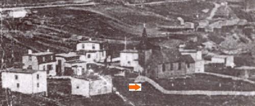 View of Lower Street area of Torbay, NL, circa 1919, including Old St. Nicholas Church and Cemetery.; Torbay Museum 2007